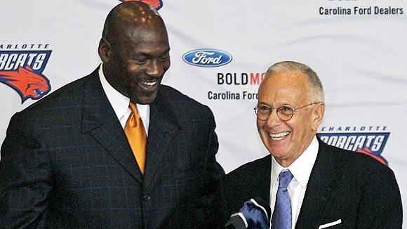 Jordan   seen  here  with  Bobcats'   head  coach   ,  Larry  Brown  .  The  two   former   Tar Heels   are   hoping  to   bring  to  make  the   franchise  a  perennial   contender  and   amongst  the  'elite' organizations   competitively  within  the  NBA.   photo  appears  courtesy  of   Getty  Images North  America  /   Paul   Buelle  ..................