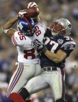 The catch seen around the globe and sank the hearts of thousands of Patriots' fans nationwide from SB XLII . David Tyree's immaculate reception . Getty Images / Chris Southwick ....